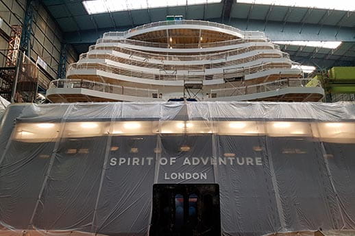 The name 'Spirit of Adventure' emblazoned on the ship